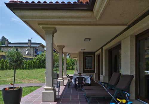 Porche en chalet unifamiliar
